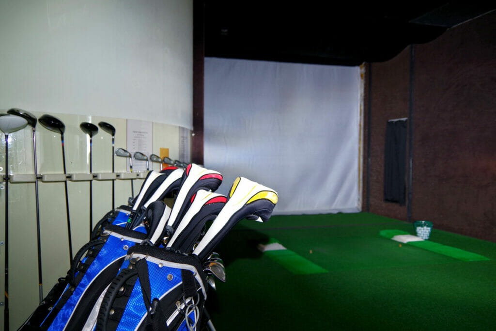 in home golf simulator room in basement